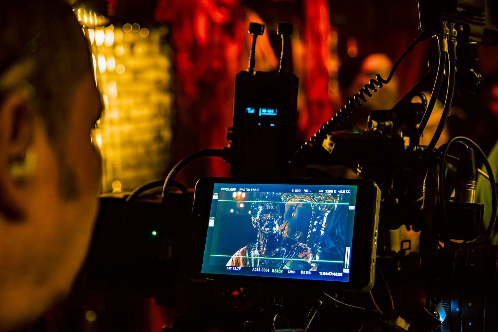 Operator watching a take on the camera monitor