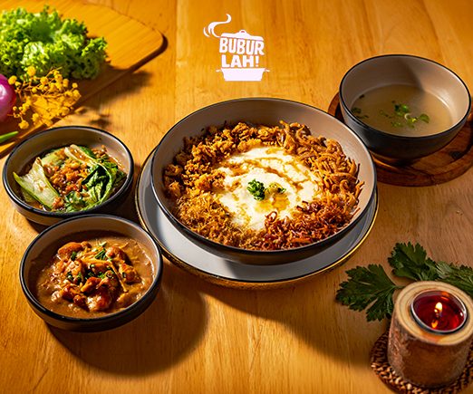 Porridge and side dishes arranged on a warm timber table